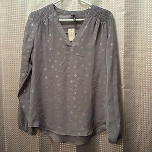Women’s long sleeve Maurice’s top. Size small.